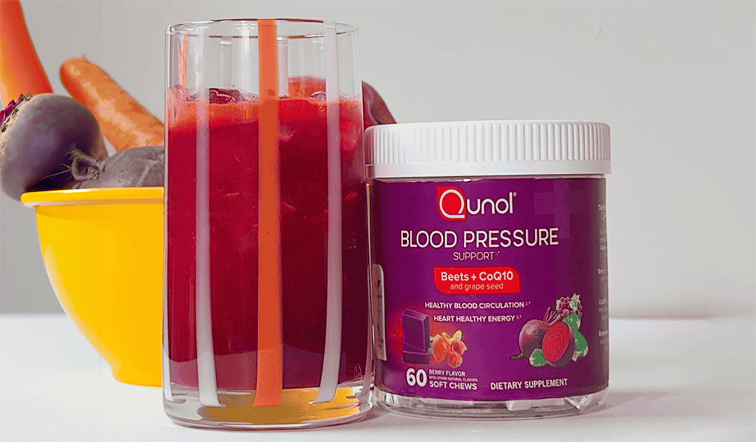 Glass of Beet Juice next to Qunol Blood Pressure Chews container